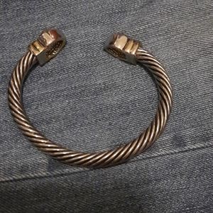 Bangle style silver tone bracelet